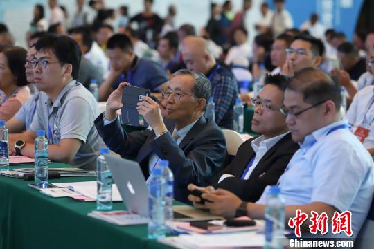 研討會現(xiàn)場圖?！■暮陚?攝